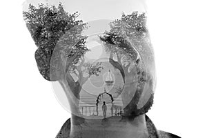 An artistic paintography portrait of a young man in double exposure technique