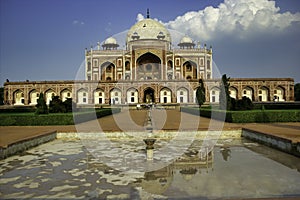 Artistic perspective of Humayun tomb architecture against a blue sky located in New Delhi, India