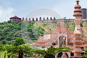 artistic red stone jain temple at morning from unique angle