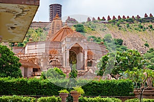 artistic red stone jain temple at morning from unique angle