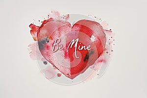 An artistic red Valentine's card, a watercolor heart in shades of red and pink. heart appears hand-painted photo