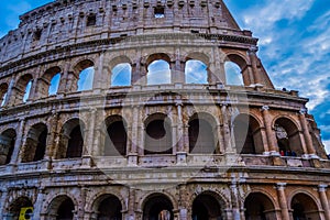 Artistic ruins of Roman Colosseum or coloseum an ancient gladiator Amphitheatre in Rome Italy