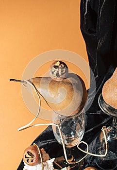 Artistic still life with pears and medlar. Creative poster and wallpaper concept