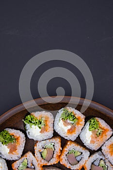 Artistic Sushi Arrangement on Wooden Platter