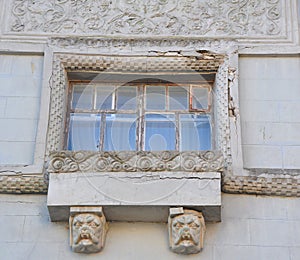 Artistic window framing in cracks. Dacha Otrada Victoria. Feodosia, Crimea