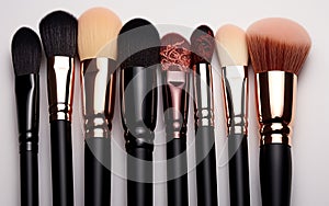 Artistry in Pastels: Collection of Makeup Brushes on a pastel Background