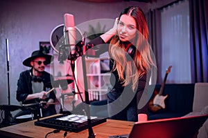 Artists using various instruments for record music in studio