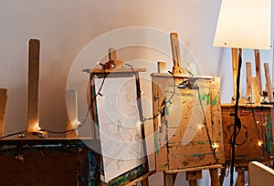 String lights decorating drawing easels in an artistic classroom environment photo