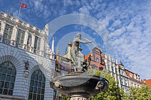 The Artus Court Dwor Artusa and Neptune Fountain in Old Town in city of Gdansk, Poland