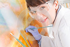 Artwork conservator at work