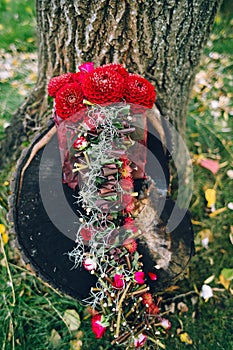 Artwork. Flower composition with bordeaux dahlias for bride hand. Wedding decoration.