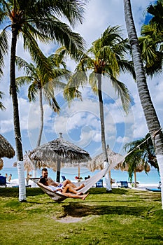 Aruba Caribbean Hammock on the beach with palm trees