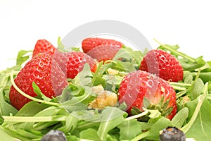 Arugula salad w/berries & nuts upclose