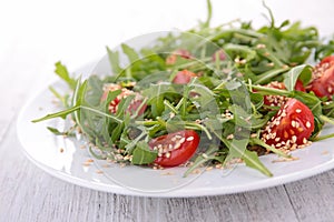 Arugula,tomato and sesam