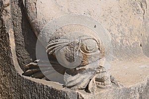 Ð¡arved stone dolphin - the armrest of the stone chair in ancient theater in Myra