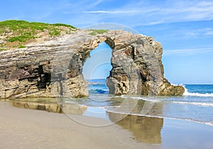 Scenic cliffs view of Praia das Catedrais, famous beach in Galicia, northern Spain photo