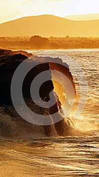 As Catedrais Cathedral beach at sunset in Galicia, Spain photo