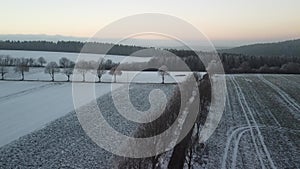 As the drone ascends into the crisp winter air, a breathtaking panorama unfolds below