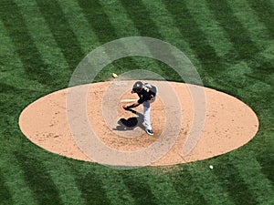 As Gio Gonzalez throws pitch, ball can be seen air