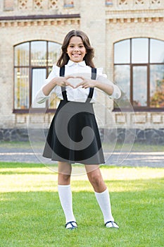 As individual as you. childhood happiness. vintage kid fashion. small student girl on grass. back to school. girl