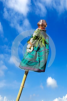 A hosted `Gudhi` on a clear background of gorgeous blue sky. Gudi Padwa is the Hindu New Year Day. photo