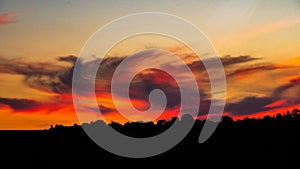 Wispy clouds at sunset photo