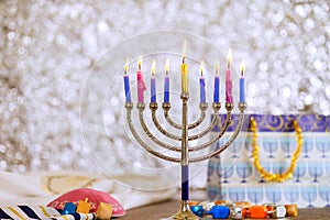 As a symbol of Hanukkah in Jewish religion, Hanukkiah Menorah is lit by burning candles