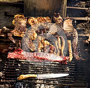 Asado are the techniques and the social event of having photo