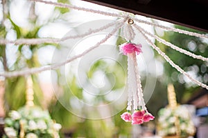 Asain white and pink flower wedding decoration in wedding ceremony day.