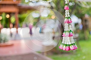 Asain white and pink flower wedding decoration in wedding ceremony day.