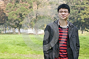 Asain young man in park