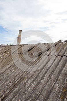 Asbestos old dangerous roof tiles.