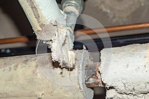 Asbestos pipe insulation above ceiling