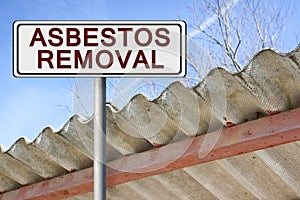Asbestos removal written on a placard