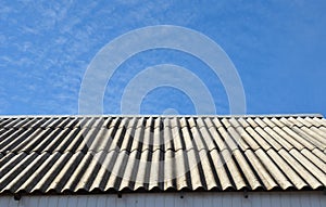 Asbestos roof removal. Asbestos house roofing construction.