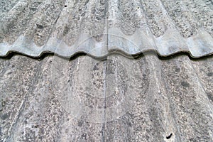 Asbestos tiles on the wall. Nature pollution dangerous