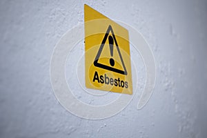 Asbestos warning sign on building