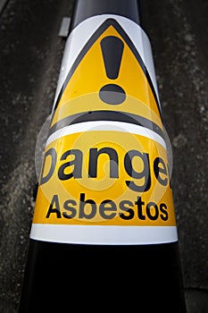 Asbestos warning sign on building