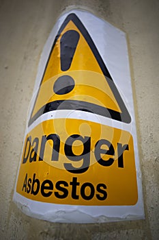 Asbestos warning sign on building