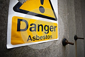 Asbestos warning sign on building