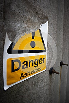 Asbestos warning sign on building