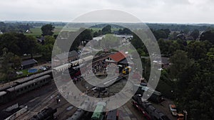 Ascending aerial view of steam train marshalling yard