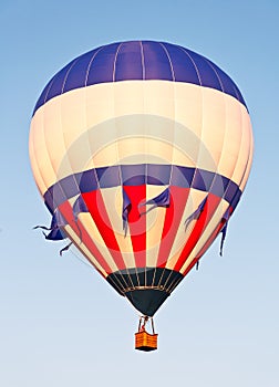 Ascending Red White and Blue Balloon