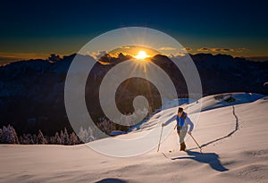 Ascending to the top. Ski mountaineering Cross country skiing al