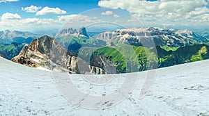 Ascent to Marmolada, Dolomites, Italy. The Marmolada Glacier. Tourist climbing on Marmolada mountain in dolomites. Ice axe in the