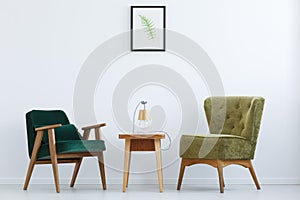 Ascetic interior with green chairs photo