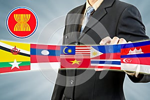 ASEAN Economic Community in businessman hand