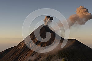 Ash cloud after an explosion at volcano Fuego photo