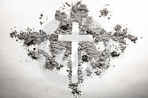 Ash wednesday cross, crucifix made of ash, dust as christian rel