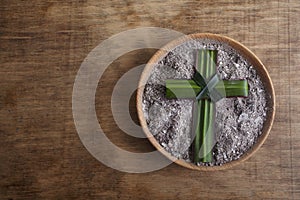 Ash wednesday, crucifix made of ash, dust as christian religion. Lent beginning